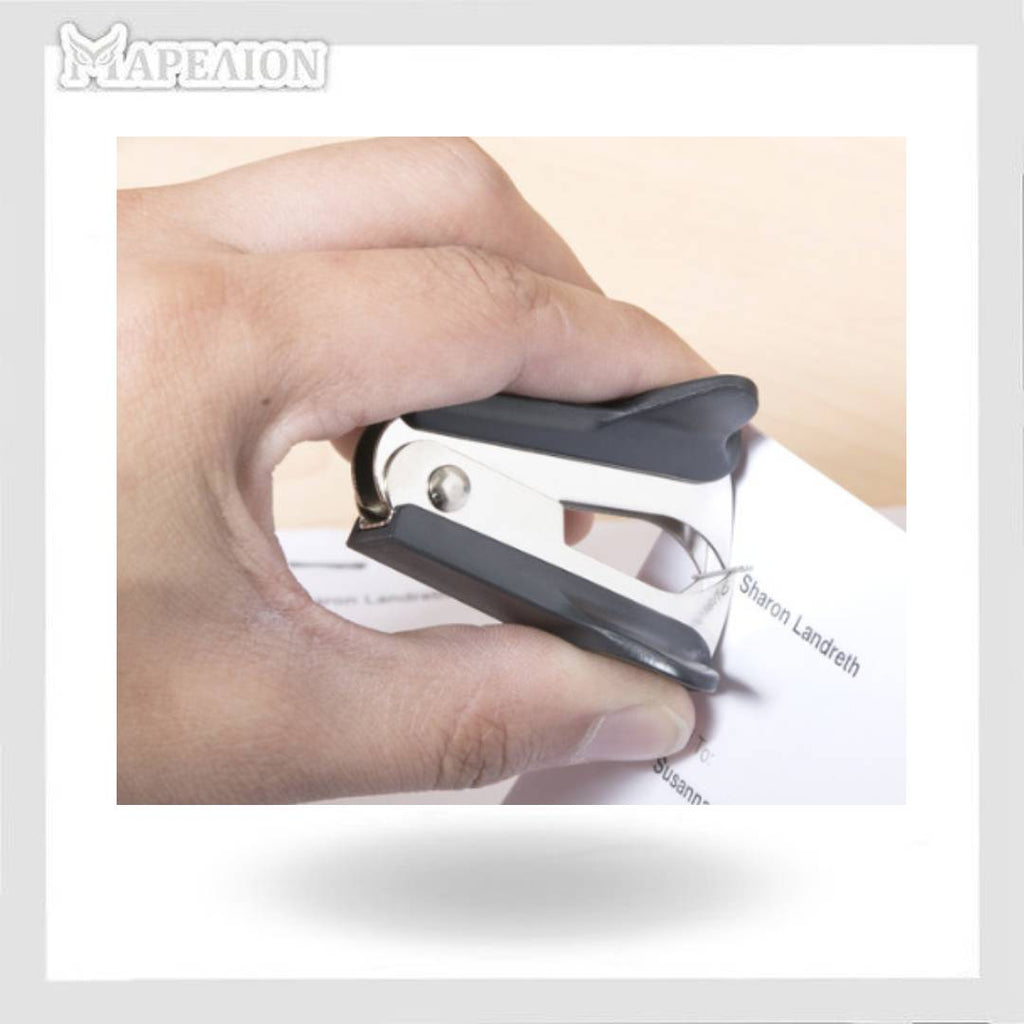 Hand using a stapler on a piece of paper with 'Mapeion' branding.