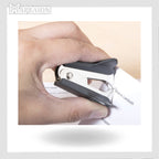 Hand using a stapler on a piece of paper with 'Mapeion' branding.