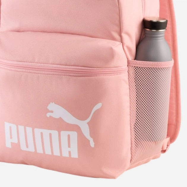 Pink Puma backpack with a water bottle in a pocket on a white background